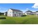Exterior view of a two story home with white siding and green grass at 301 Sandy Oak Dr, Loganville, GA 30052