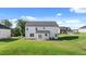 New construction home with walkout patio and large backyard lawn at 301 Sandy Oak Dr, Loganville, GA 30052