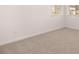 Neutral bedroom with carpet floors, natural light, and double windows at 301 Sandy Oak Dr, Loganville, GA 30052