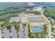 Aerial view of neighborhood tennis courts with parking and landscaping, a great amenity for active residents at 424 Lake Point Trce, Canton, GA 30114