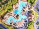 Overhead shot of the community pool area with multiple pools, cabanas, seating and landscaped areas at 424 Lake Point Trce, Canton, GA 30114