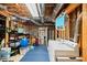 Unfinished basement with exposed ductwork and wood frame construction at 424 Lake Point Trce, Canton, GA 30114