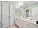 Bright bathroom with double vanity, ample storage, and neutral tones at 424 Lake Point Trce, Canton, GA 30114