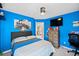This blue bedroom features train decor and a large flatscreen television at 424 Lake Point Trce, Canton, GA 30114