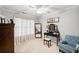 Bright bedroom with comfortable seating area, full length mirror, and lots of natural light at 424 Lake Point Trce, Canton, GA 30114