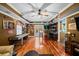Finished basement game room with hardwood floors, bar, and a shuffleboard table at 424 Lake Point Trce, Canton, GA 30114