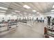 Large gym featuring weightlifting equipment, dumbbells, and ample space for various workout routines at 424 Lake Point Trce, Canton, GA 30114