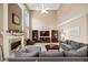 Bright living room with high ceilings, fireplace, and an adjacent modern kitchen at 424 Lake Point Trce, Canton, GA 30114