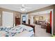 Main bedroom with a sitting area, offering a private retreat with a comfortable aesthetic at 424 Lake Point Trce, Canton, GA 30114