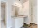 This spacious bathroom features a modern vanity with lots of natural light at 7006 Mahonia Place, Stonecrest, GA 30038