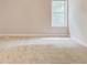 Neutral bedroom with carpet and window at 7006 Mahonia Place, Stonecrest, GA 30038