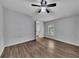 Bedroom featuring hardwood floors, neutral wall color and ceiling fan at 845 Oak Nw St, Atlanta, GA 30318