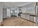 Bright kitchen featuring stainless steel appliances, granite countertops, and hardwood flooring at 845 Oak Nw St, Atlanta, GA 30318