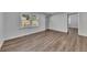 Bright living room featuring waterproof vinyl flooring and freshly painted walls at 845 Oak Nw St, Atlanta, GA 30318