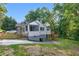 Rear exterior featuring a small deck and access to a private backyard at 845 Oak Nw St, Atlanta, GA 30318