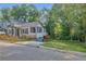 Quaint home with a screened in porch and access to a private backyard at 845 Oak Nw St, Atlanta, GA 30318