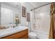 Well-lit bathroom with a single sink, a shower and bathtub combo at 169 Winding Valley Dr, Rockmart, GA 30153