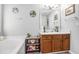 Bathroom featuring tub, neutral paint, hardwood floors and updated fixtures at 169 Winding Valley Dr, Rockmart, GA 30153