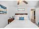 Cozy bedroom with ceiling fan, wooden headboard, and calming decor at 169 Winding Valley Dr, Rockmart, GA 30153