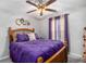 Bedroom featuring neutral paint, hardwood floors and updated fixtures at 169 Winding Valley Dr, Rockmart, GA 30153