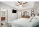 Beautiful main bedroom with hardwood floors, tray ceilings, updated fixtures and neutral paint at 169 Winding Valley Dr, Rockmart, GA 30153