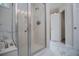 Bathroom featuring bathtub, shower, sink and mirror at 9691 Squirrel Wood Run, Douglasville, GA 30135