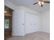 Bedroom features carpet, closet, and doorway at 9691 Squirrel Wood Run, Douglasville, GA 30135