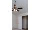 Bedroom featuring carpeted floors, neutral walls, ceiling fan, and a walk-in closet at 9691 Squirrel Wood Run, Douglasville, GA 30135