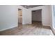 Dining Room featuring wood look floors and bright light at 9691 Squirrel Wood Run, Douglasville, GA 30135