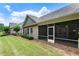 Well-maintained backyard with a covered screened porch at 1896 Grove Field Ln # 29, Marietta, GA 30064