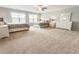 Expansive bedroom featuring two beds, large windows, and neutral carpeting at 1896 Grove Field Ln # 29, Marietta, GA 30064