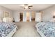 Generous bedroom with two beds, abundant space, and an en-suite bathroom and walk in closet at 1896 Grove Field Ln # 29, Marietta, GA 30064