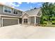 Beautiful two-story home showcasing a two-car garage and professionally landscaped yard at 1896 Grove Field Ln # 29, Marietta, GA 30064