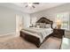 An open-concept main bedroom featuring large windows, and furniture at 1896 Grove Field Ln # 29, Marietta, GA 30064