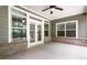 Inviting screened porch with access to the backyard through glass doors, perfect for outdoor enjoyment at 1896 Grove Field Ln # 29, Marietta, GA 30064
