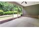 Relaxing screened porch with ample space and views of the landscaped backyard at 1896 Grove Field Ln # 29, Marietta, GA 30064