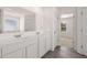 Bathroom with double vanity and tiled floor at 281 Sandy Oak Dr, Loganville, GA 30052