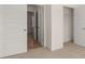Spacious bedroom features neutral carpet and an ensuite closet and bath at 281 Sandy Oak Dr, Loganville, GA 30052