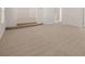Carpeted room with two steps at 281 Sandy Oak Dr, Loganville, GA 30052