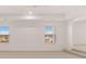 Spacious bedroom features two large windows for natural light at 281 Sandy Oak Dr, Loganville, GA 30052