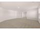 Large bonus room featuring neutral carpet, ample space, and bright recessed lighting at 281 Sandy Oak Dr, Loganville, GA 30052
