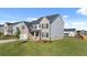 A lovely two-story home shows a large lawn and neighborhood feel at 281 Sandy Oak Dr, Loganville, GA 30052