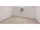 Walk-in closet with a window and shelving at 281 Sandy Oak Dr, Loganville, GA 30052