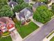 A well-maintained home with a manicured lawn and established landscaping stands out in this residential neighborhood at 310 Arbor Creek Trl, Roswell, GA 30076