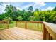 Spacious backyard deck overlooking lush green landscape at 6213 Cherry Ln, Douglasville, GA 30134