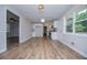 Bright kitchen area with modern white cabinets and stainless steel appliances at 6213 Cherry Ln, Douglasville, GA 30134