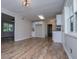 Bright kitchen area with modern white cabinets and stainless steel appliances at 6213 Cherry Ln, Douglasville, GA 30134