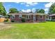 Charming brick ranch with a well-manicured lawn and inviting front entrance at 821 Springvalley Dr, Forest Park, GA 30297