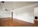 Spacious living room features hardwood floors and neutral walls, ideal for entertaining at 821 Springvalley Dr, Forest Park, GA 30297