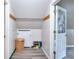 A storage closet with an open door, clothing rod, and a Life Ladder escape box at 1809 Brandi Ln, Loganville, GA 30052